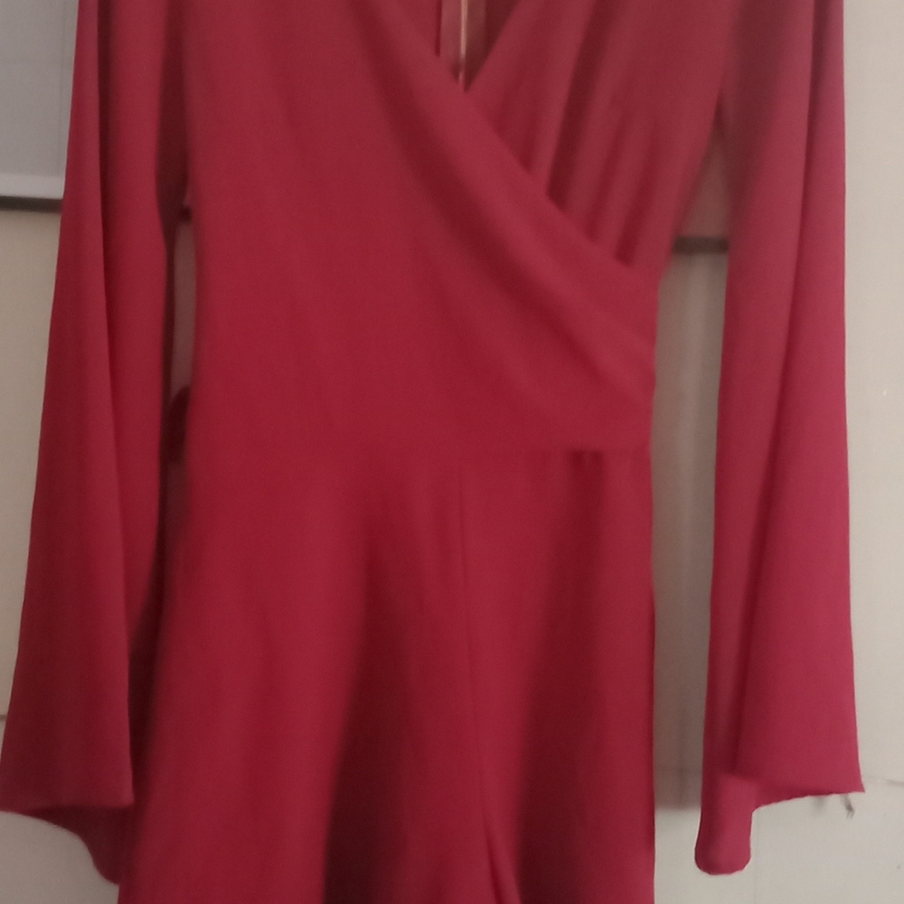 Red romper with bell sleeves..sz S